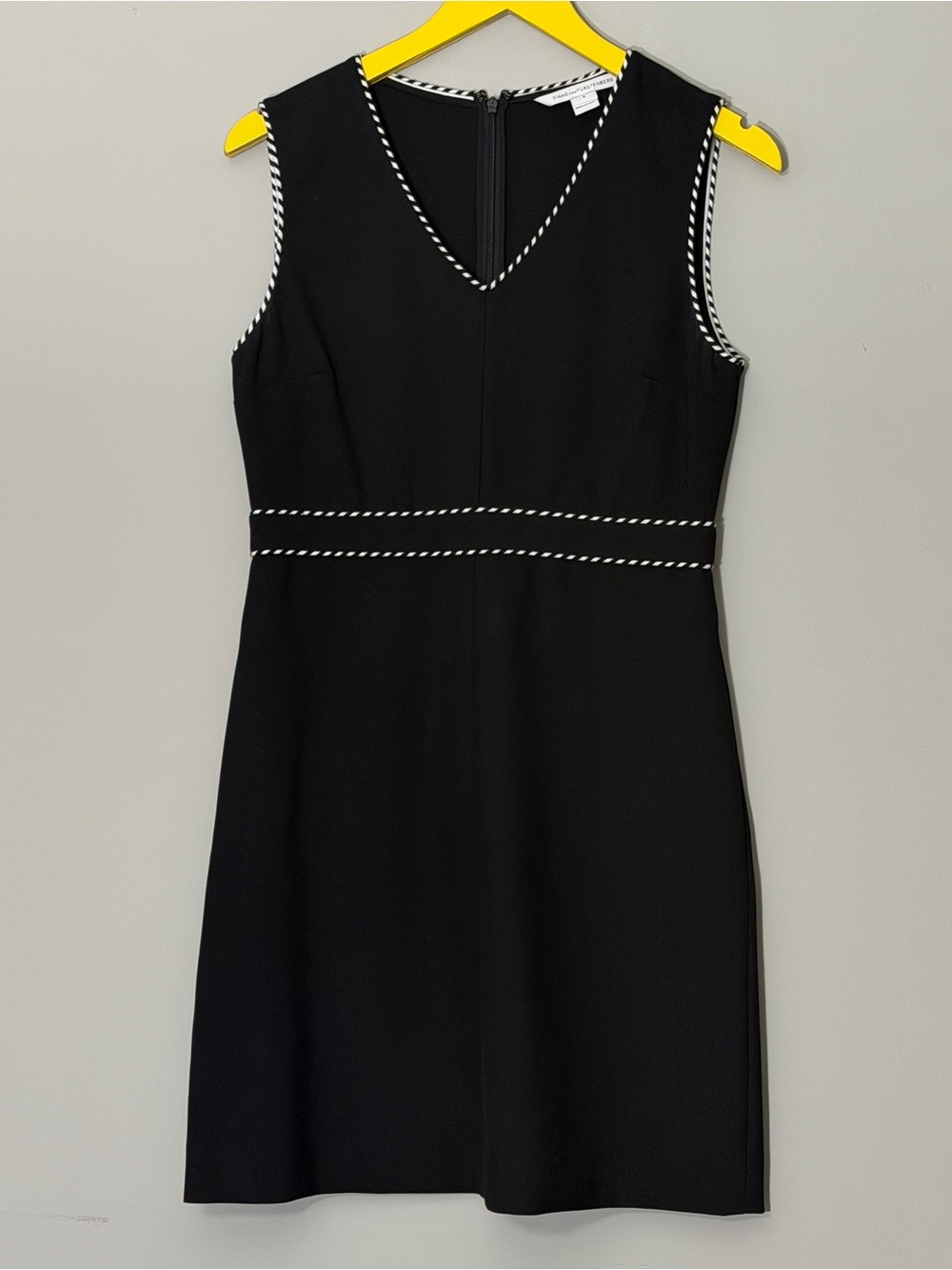 Diane von Furstenberg black mini dress with white stitching Size 6